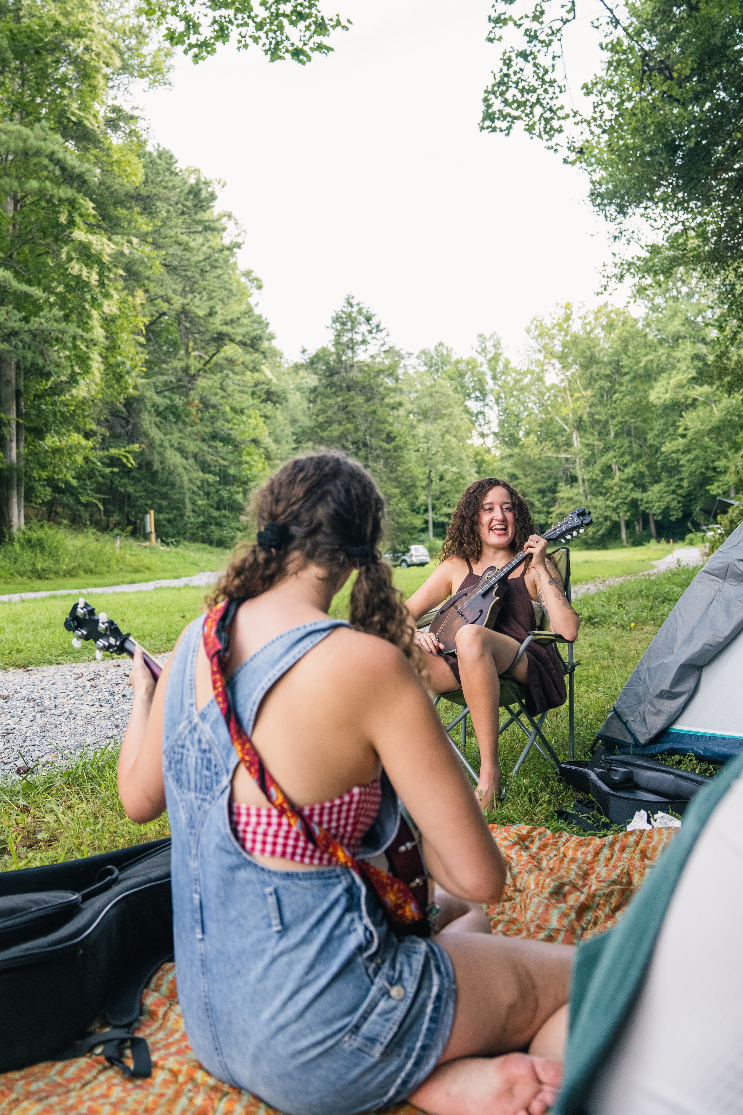 Friends playing music at BYOT camping area at Wunderland Resort